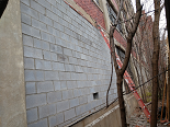 Window removal and infill with Concrete Masonry Unit (CMU)